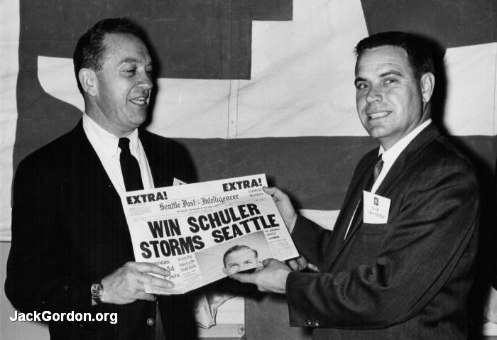 Win Schuler and Dick Lenington holding a Seattle P-I